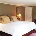 Bed with bright white bed spread
