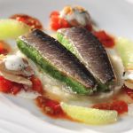 Stuffed fish on a rice bed