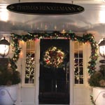 The front entryway of The Homestead Inn decorated for the winter holidays
